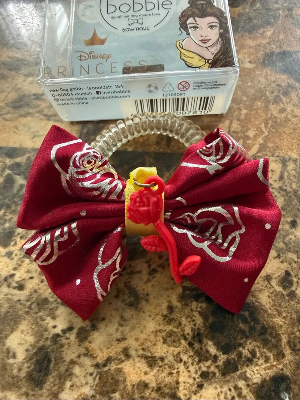 Disney burgundy bow hair ring with yellow and red rose charm